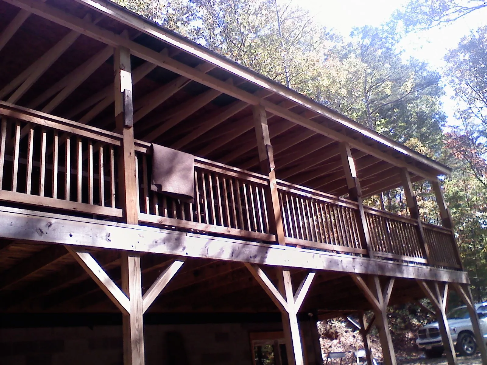 Timber framing under a new elevated porch and deck — Roof Leak Repair in Waleska by Roofing Brothers